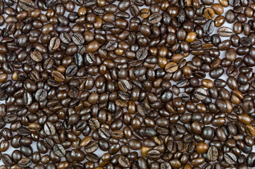 Close Up of Roasted Coffee Beans Isolated on White Background