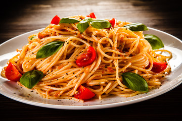 Pasta with meat, tomato sauce and vegetables 