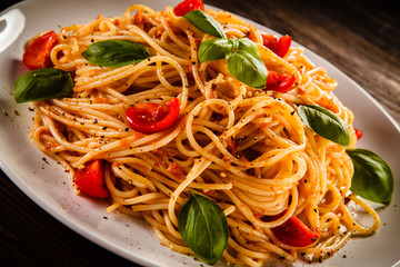 Pasta with meat, tomato sauce and vegetables 