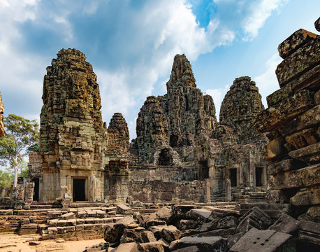 Prasat Bayon with smiling stone faces is the central temple of Angkor Thom Complex, Siem Reap, Cambodia. Ancient Khmer architecture and famous Cambodian landmark, World Heritage.