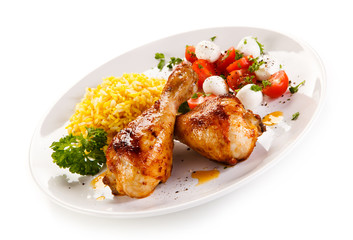 Roasted chicken drumsticks white rice and vegetables