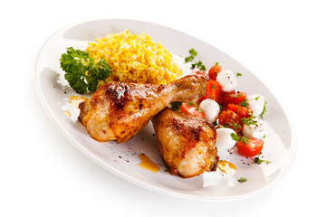 Roasted chicken drumsticks white rice and vegetables