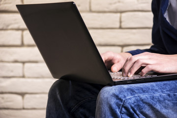 a man working at a laptop