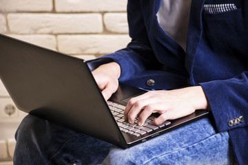 a man working at a laptop