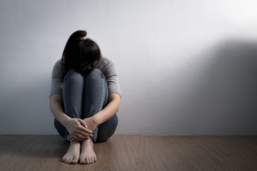 depression woman sit on floor