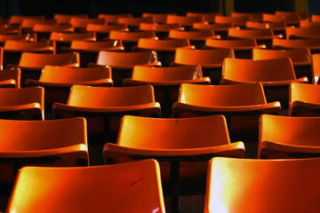 Empty seats in a stadium.
