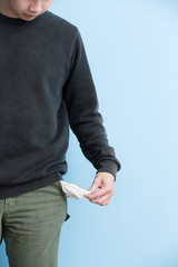 man showing his empty pockets