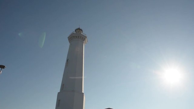 Tilt of Lighthouse of Torre Canne with flare