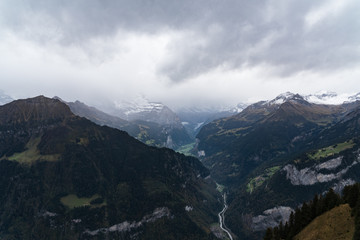 View of the Mountain Pass from atop Schynige Platte leading to Wilderswil and Gsteigwiler, Switzerland.