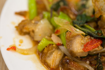 Close up of stir-fried pork and basil