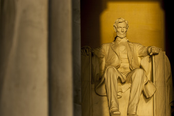 Statue of Abraham Lincoln in brilliant warm dramatic morning sunlight