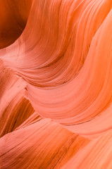 Pink peach wave shapes photographed at slots canyons in Arizona.