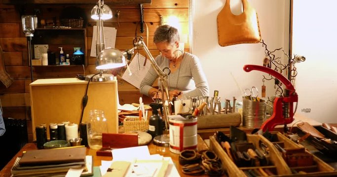 Attentive craftswoman working