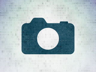 Travel concept: Photo Camera on Digital Data Paper background