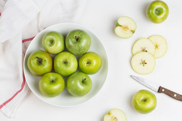 Apple on white table