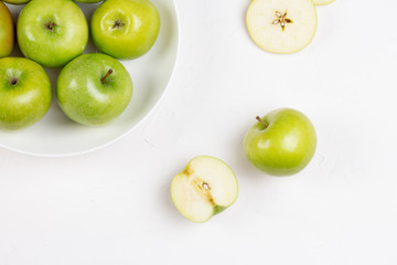 Apple on white table