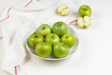 Apple on white table