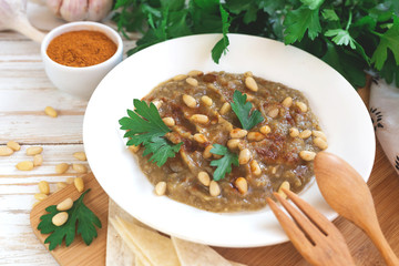 Baba ganoush - traditional arabian eggplant dip with flat bread
