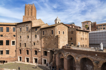 Fototapeta premium Rome, Italy. Tower (about 1200) and the ancient buildings, adjacent to the Trajan Market