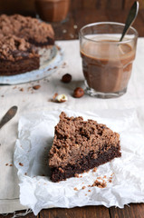 Chocolate Crumble Pie, Hazelnut Brownie on Beige and Wooden Background