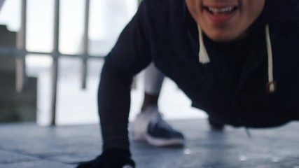 4K Athlete being trained by his coach, in slow motion