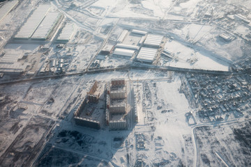 Aerial view of multi-storey houses district at winter