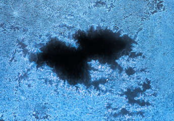 Ice patterns on glass. winter background