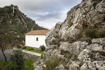 Fototapeta na wymiar big rocks and the hermitage at Barragem de Santa Luzia dam, Pampilhosa da Serra municipality, Coimbra District, Portugal