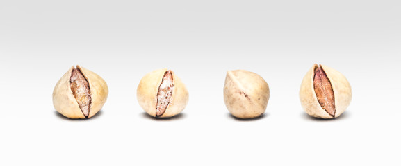 Salted fresh opened and unopened pistachio nuts