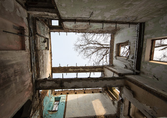destroyed house after an earthquake, snow disaster, house fire