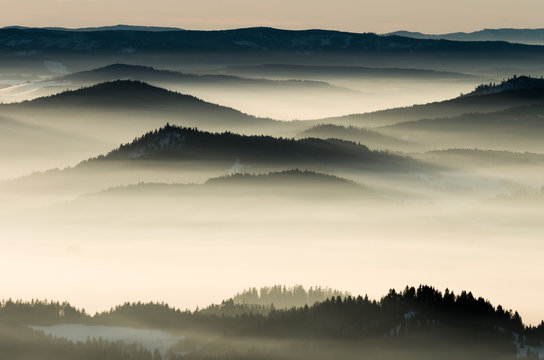 Misty mountains landscape in the morning, Poland