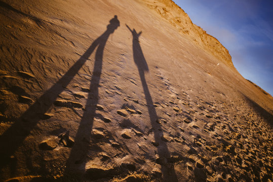 People Silhouettes on Grey (Dead) Dunes at the Curonian Spit in Neringa, Lithuania