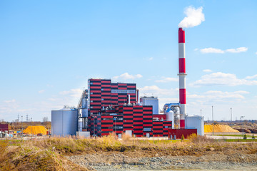 Fototapeta na wymiar Industrial power plant, Tallinn Estonia. Ecological friendly energy reneration using secondary raw materials (wooden)