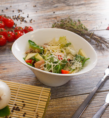 salad of arugula with cherry tomatoes and croutons
