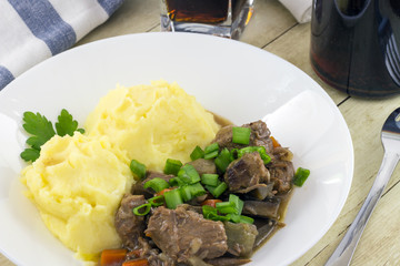 Beef and beer Irish stew with mashed potatoes
