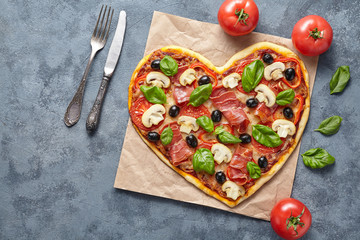 Heart shaped pizza tasty love concept Valentine's Day flat lay romantic restaurant dinner Italian...