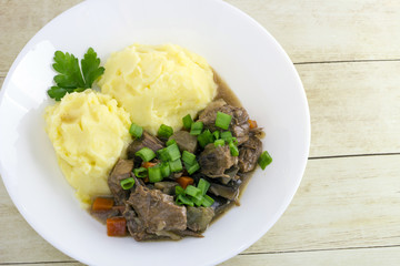 Beef and beer Irish stew with mashed potatoes