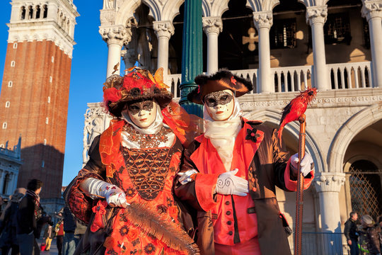 Beautiful carnival mask on San Marco square in Venice, Italy