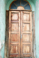 wooden decorated door with elegant carving in Lviv
