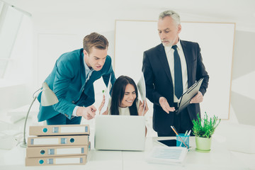 Obraz premium Angry tired businesswoman in formal wear receiving many new task