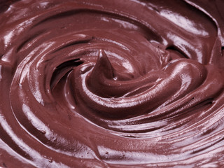 Melted chocolate or chocolate glaze.