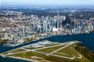 Obraz na płótnie Canvas Aerial view of downtown Toronto with Billy Bishop Island Airport in the foreground.