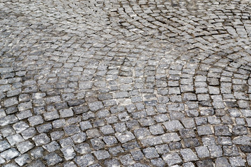 Texture of cobblestone in old town