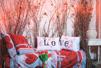 White love pillows with dark wild branches