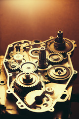 disassembled engine of motorcycle with gears