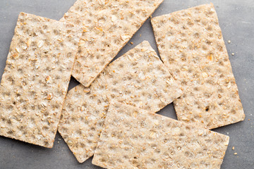 Stack of wholegrain crispy bread with sunflower, chia and sesame