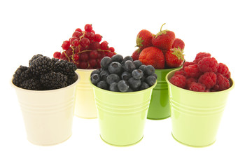 Buckets soft fruit isolated over white