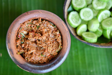 Fermented fish spicy dip in bowl baked clay