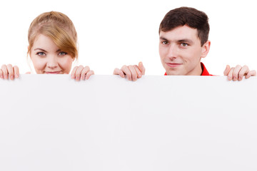 Couple with blank presentation board banner sign