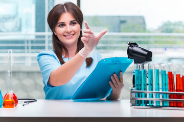 Young female doctor working in the lab